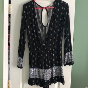 Charlotte Russe Black pattered romper medium